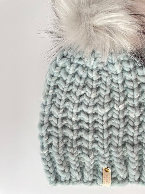 Bottle Cove Beanie in Bubble Gum Blue, Light Grey with black tipped Pom