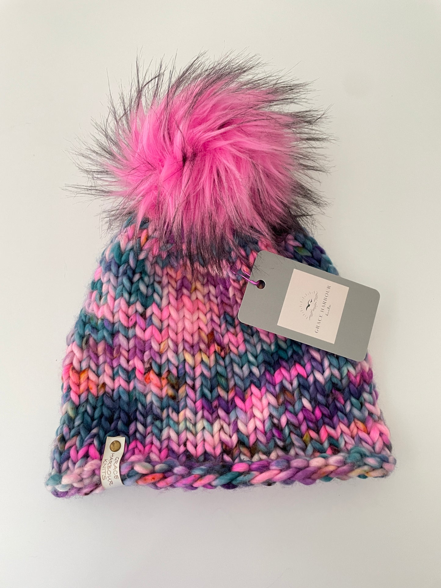 CURLY GIRL IN 'SILENT LUCIDITY' WITH SHOCKING PINK POM