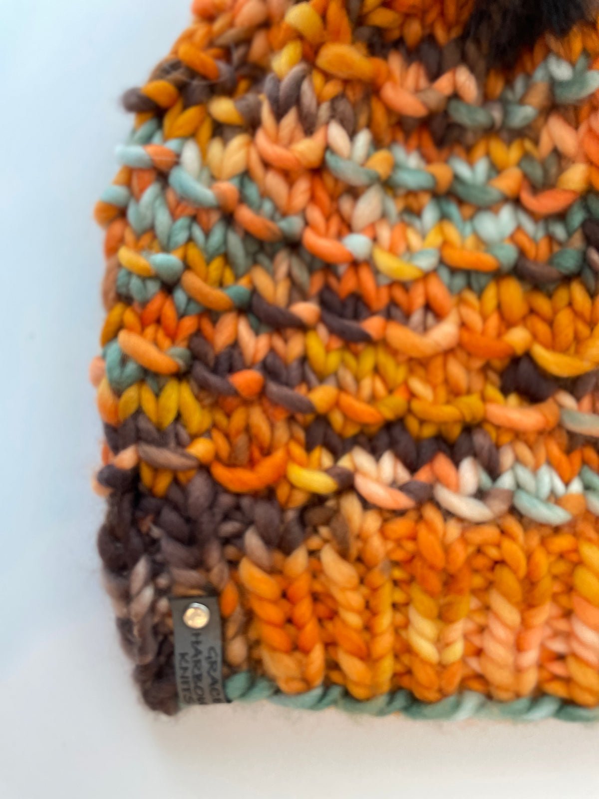 BAMBOO BEANIE IN PUMPKIN PATCH WITH BADGER FAUX FUR POM POM