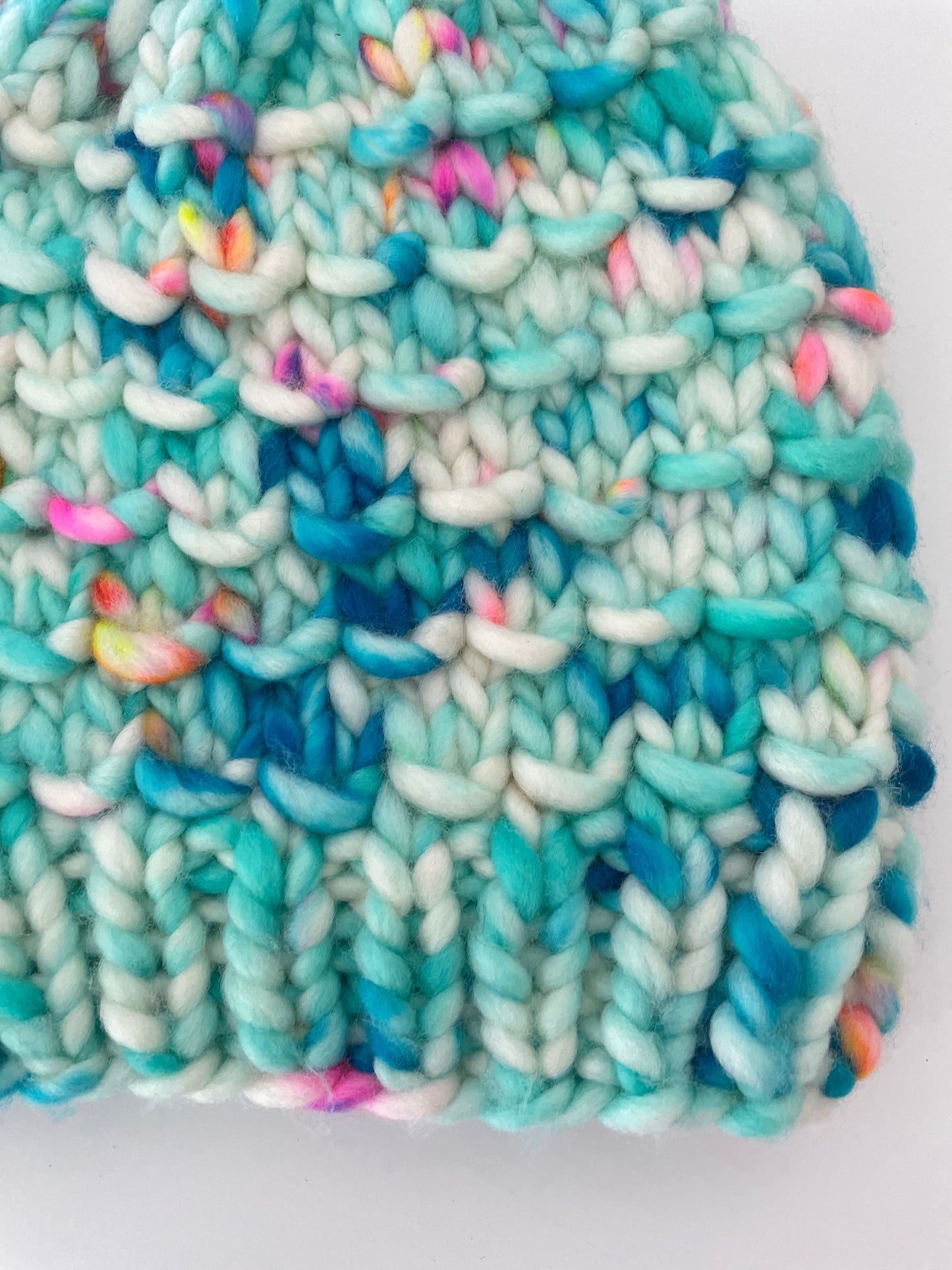 close up of beanie showing details of stitch